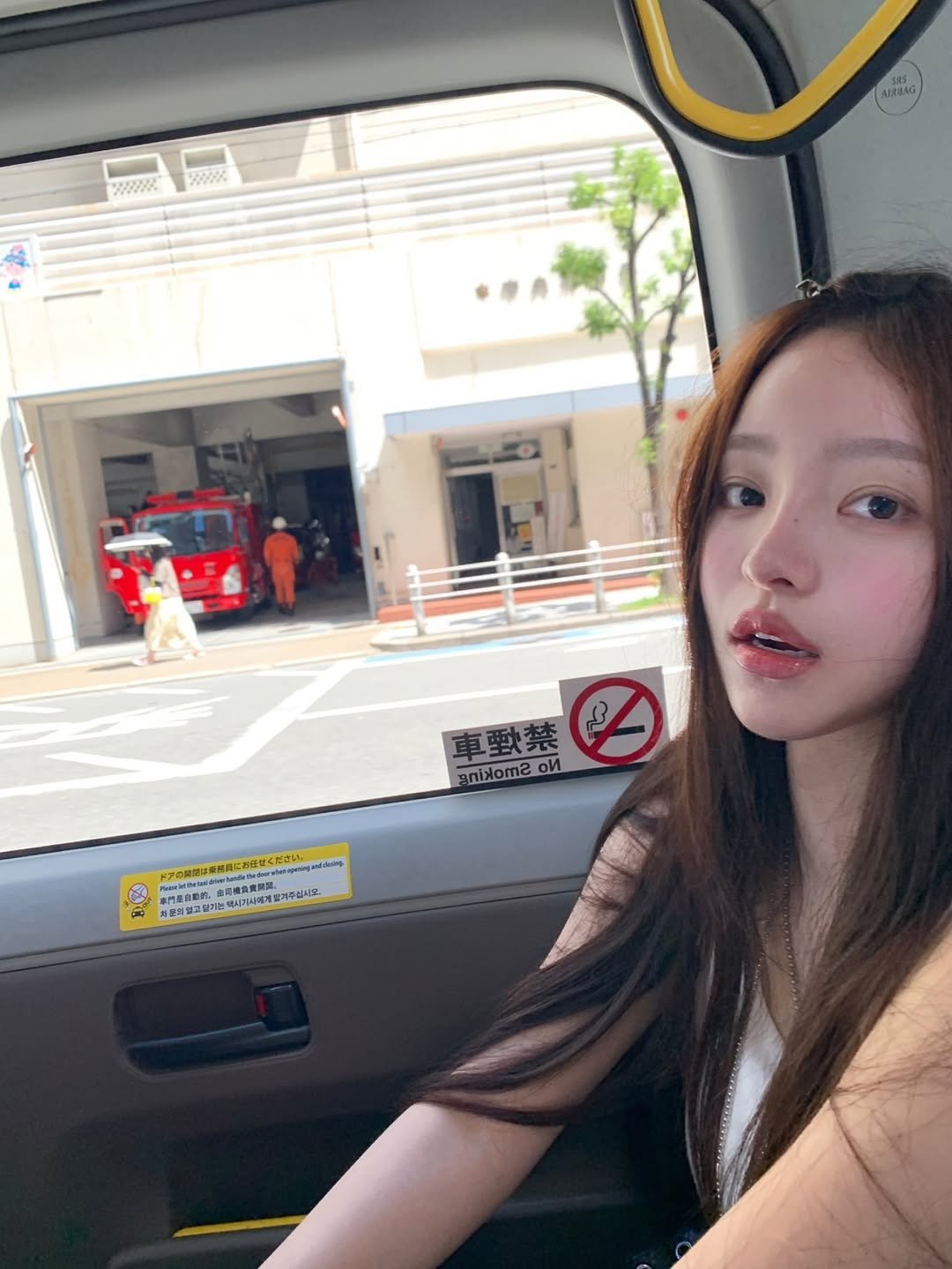 Photo by kend 켄드 on August 04, 2025. May be an image of 1 person, hair, bus and text.
