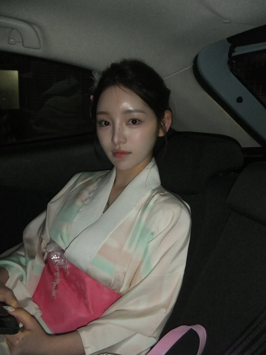 Photo shared by kend 켄드 on August 02, 2025 tagging @oxo_cam. May be an image of 1 person, hair, robe, bath robe and text.