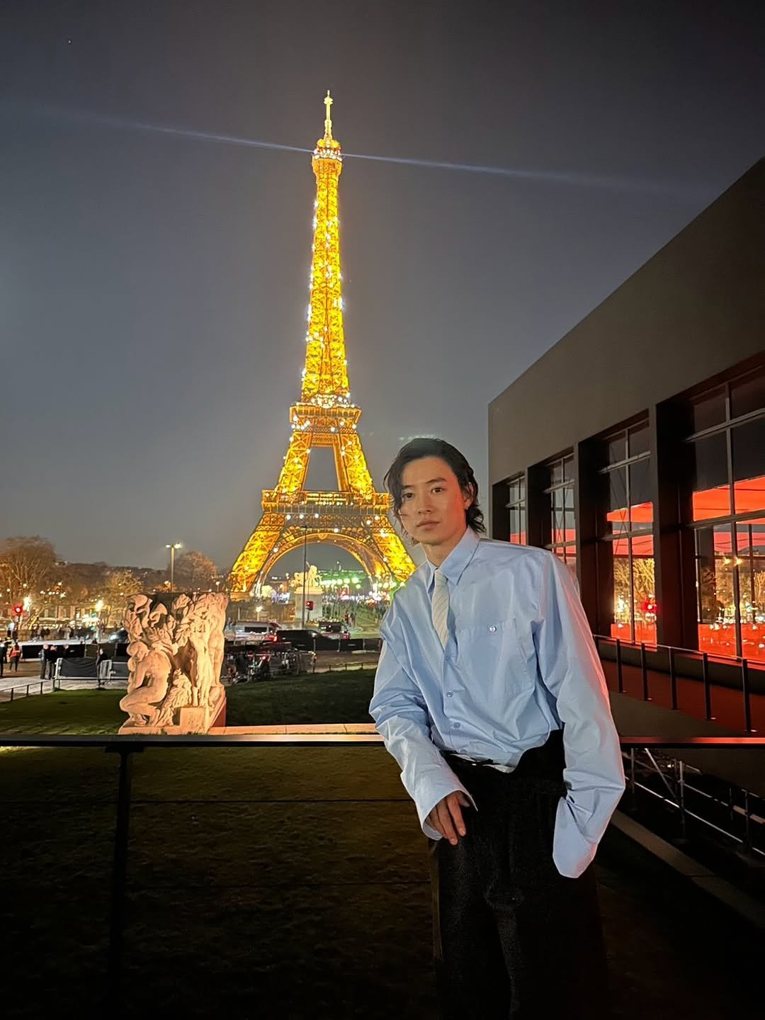 Photo shared by 山﨑賢人 on March 04, 2026 tagging @ysl, and @anthonyvaccarello. May be an image of tower and text.