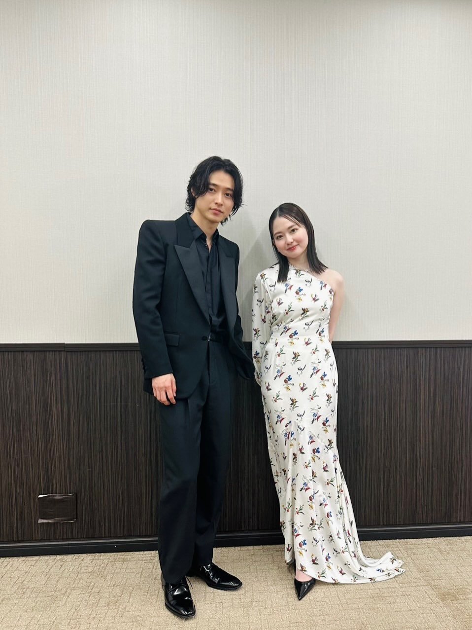Photo shared by 山﨑賢人 on March 26, 2026 tagging @ysl, and @anna_yamada_. May be an image of suit, dinner jacket and text.
