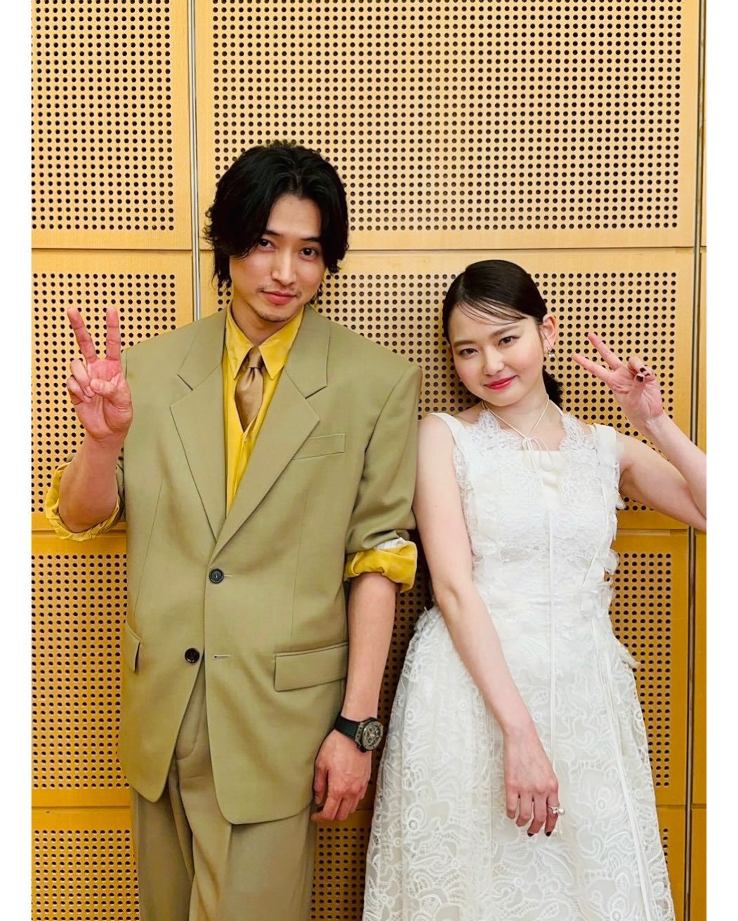 Photo shared by 山﨑賢人 on February 25, 2026 tagging @ysl, @hublot, and @anna_yamada_. May be pop art of one or more people, suit, blazer, poster, dinner jacket, wedding and text.