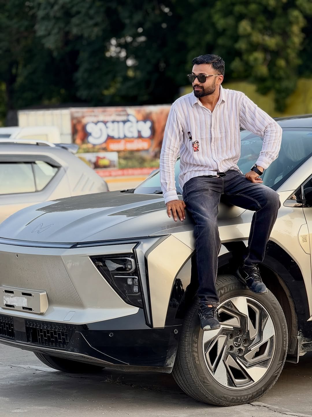 Photo by Bhatiya Kesur on November 04, 2025. May be an image of car, blazer, wheel, road and text.