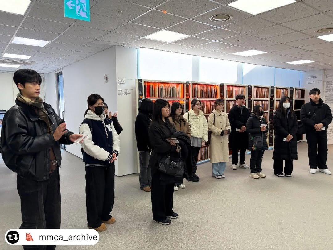 Photo by 경기대학교소성박물관 on January 22, 2026. May be an image of one or more people, people standing, clothes hanger, military uniform, office and text that says '7 mmca_archive'.