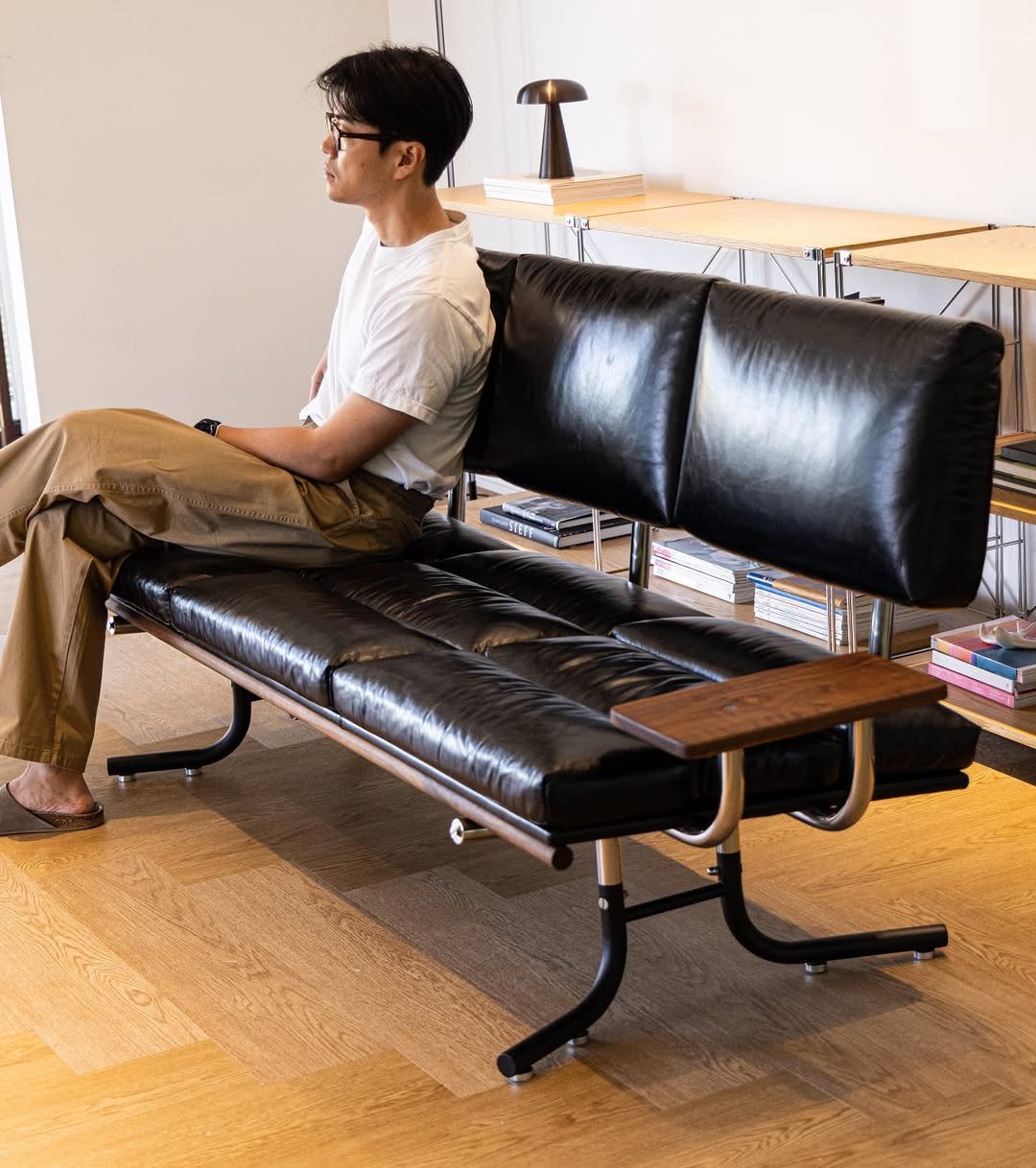 Photo by kikodesign on September 06, 2025. May be an image of 1 person, futon, chaise lounge, ottoman, chair and text.