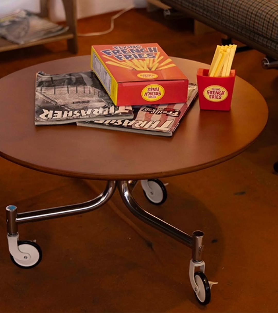 Photo by kikodesign on November 12, 2025. May be an image of french fries, newspaper, chopsticks and text.