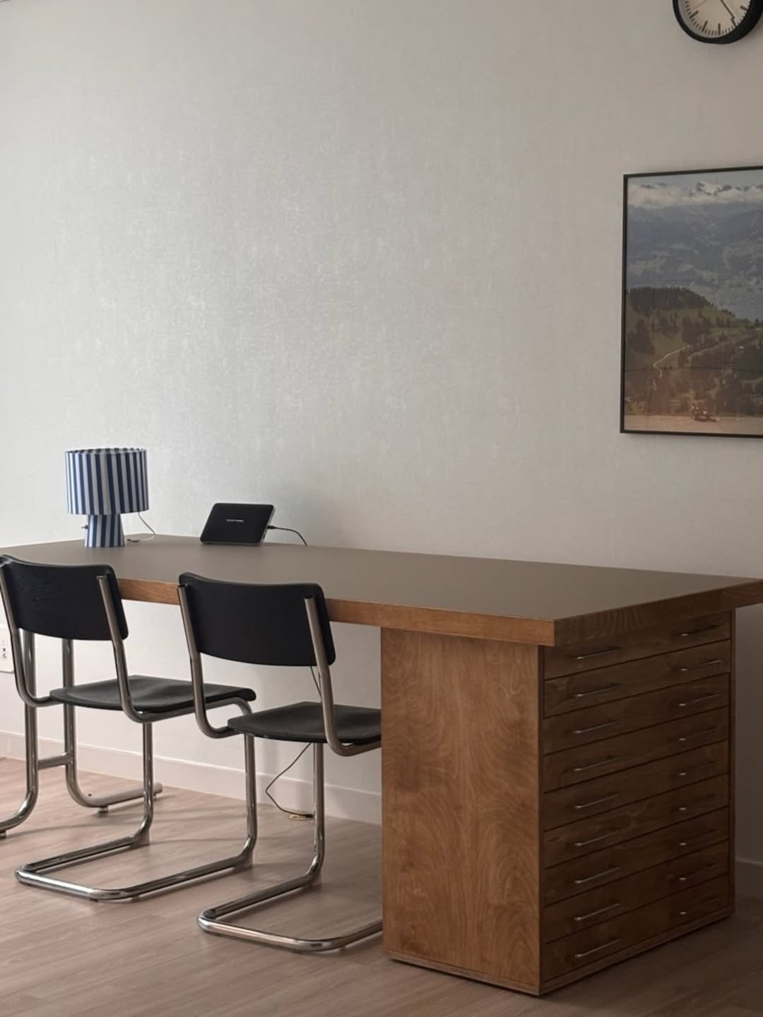 Photo by kikodesign on August 10, 2025. May be an image of table, credenza, bureau, dining table, desk, indoors, office and text.