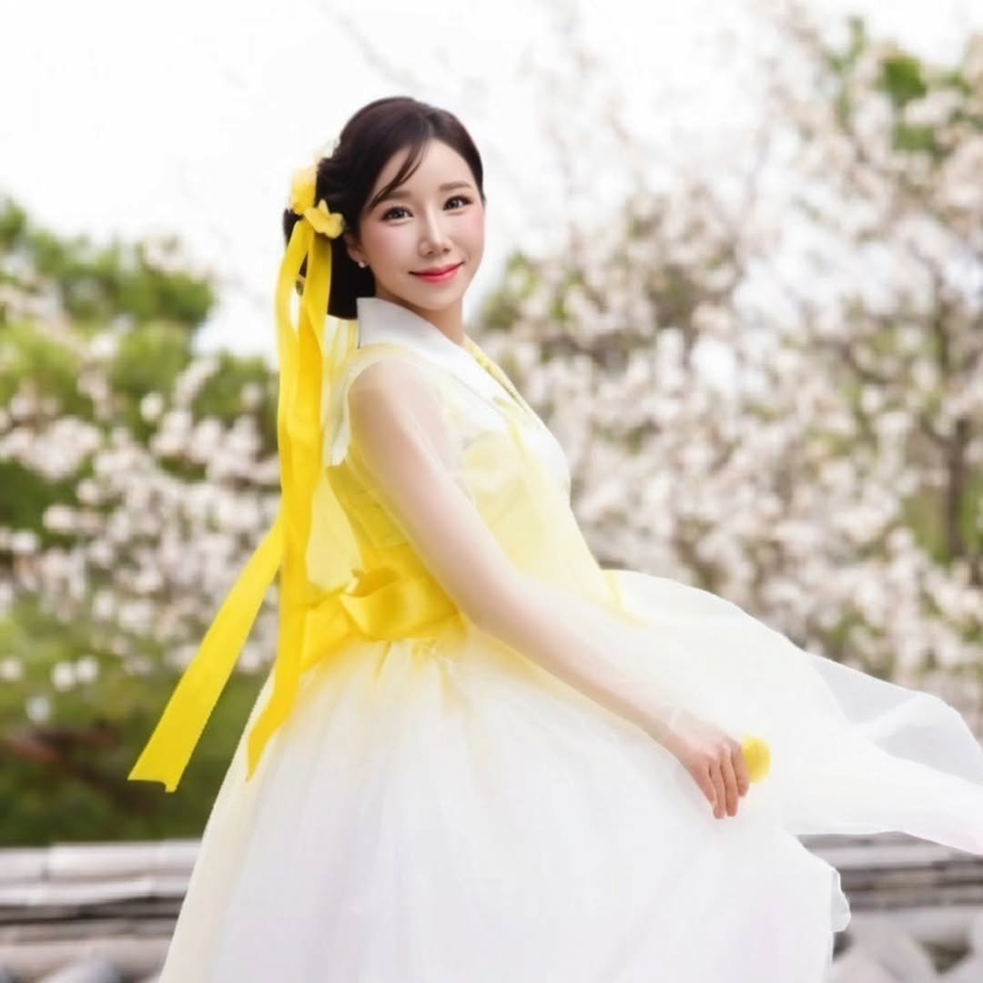 Photo shared by 김다나 on October 03, 2025 tagging @kimdana1104, and @kimdana_official. May be an image of 1 person, hair, dress and text.