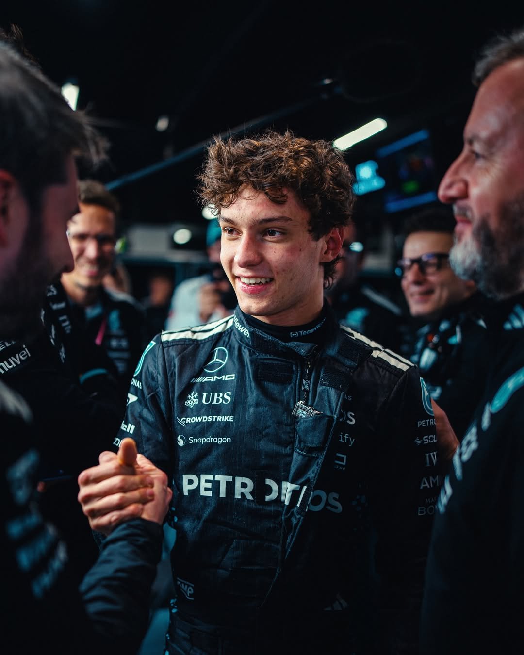 Photo by Andrea Kimi Antonelli on November 24, 2025. May be an image of racing vehicles, race car, helmet and text that says 'uv Naue JKAS MAMG 1G 福 #UBS や UBS CROWDSTRIKE ell Snapdragon Snapdragon PETR PETROFI DII'.