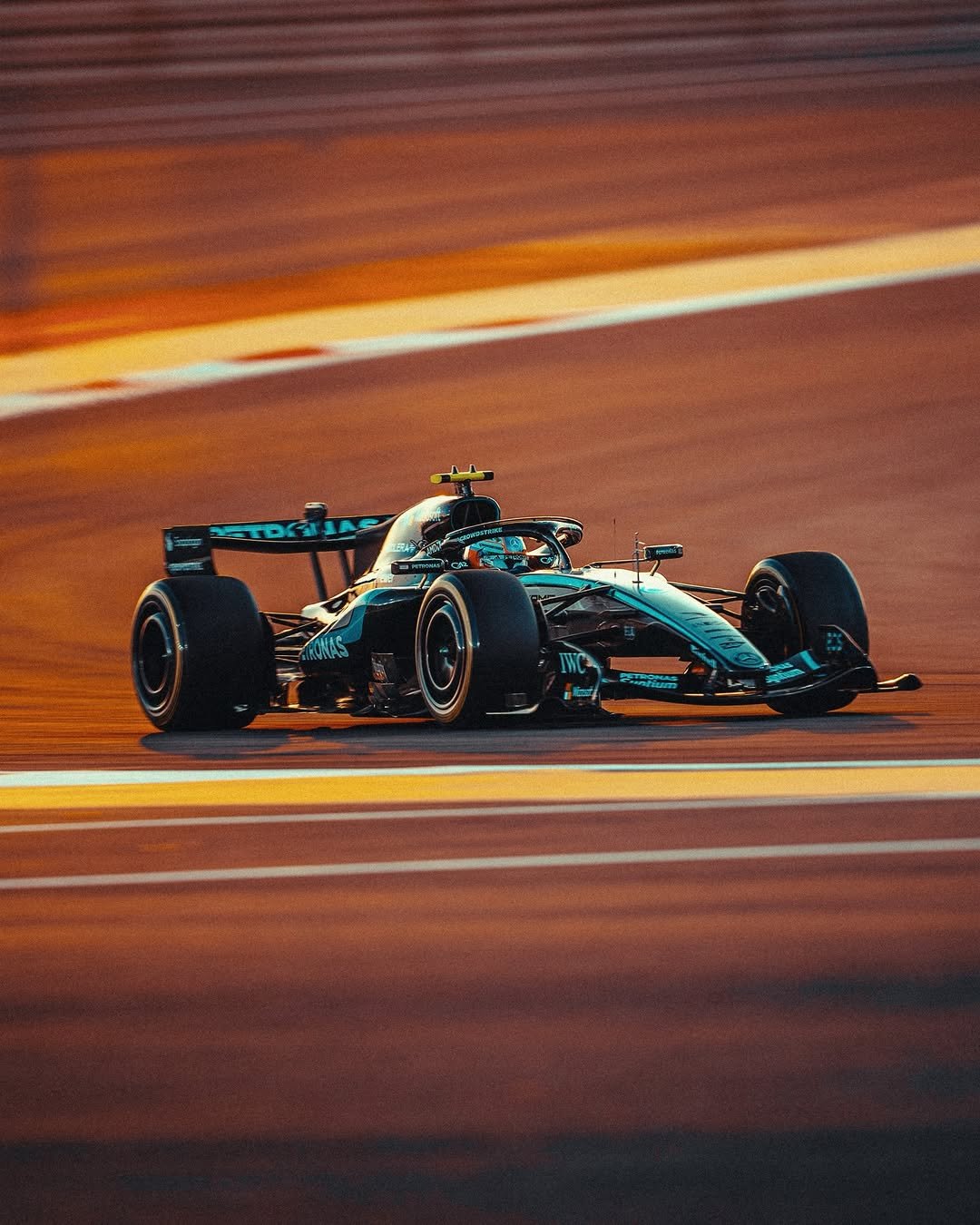 Photo by Andrea Kimi Antonelli on February 13, 2026. May be an image of racing vehicles, race car and text.