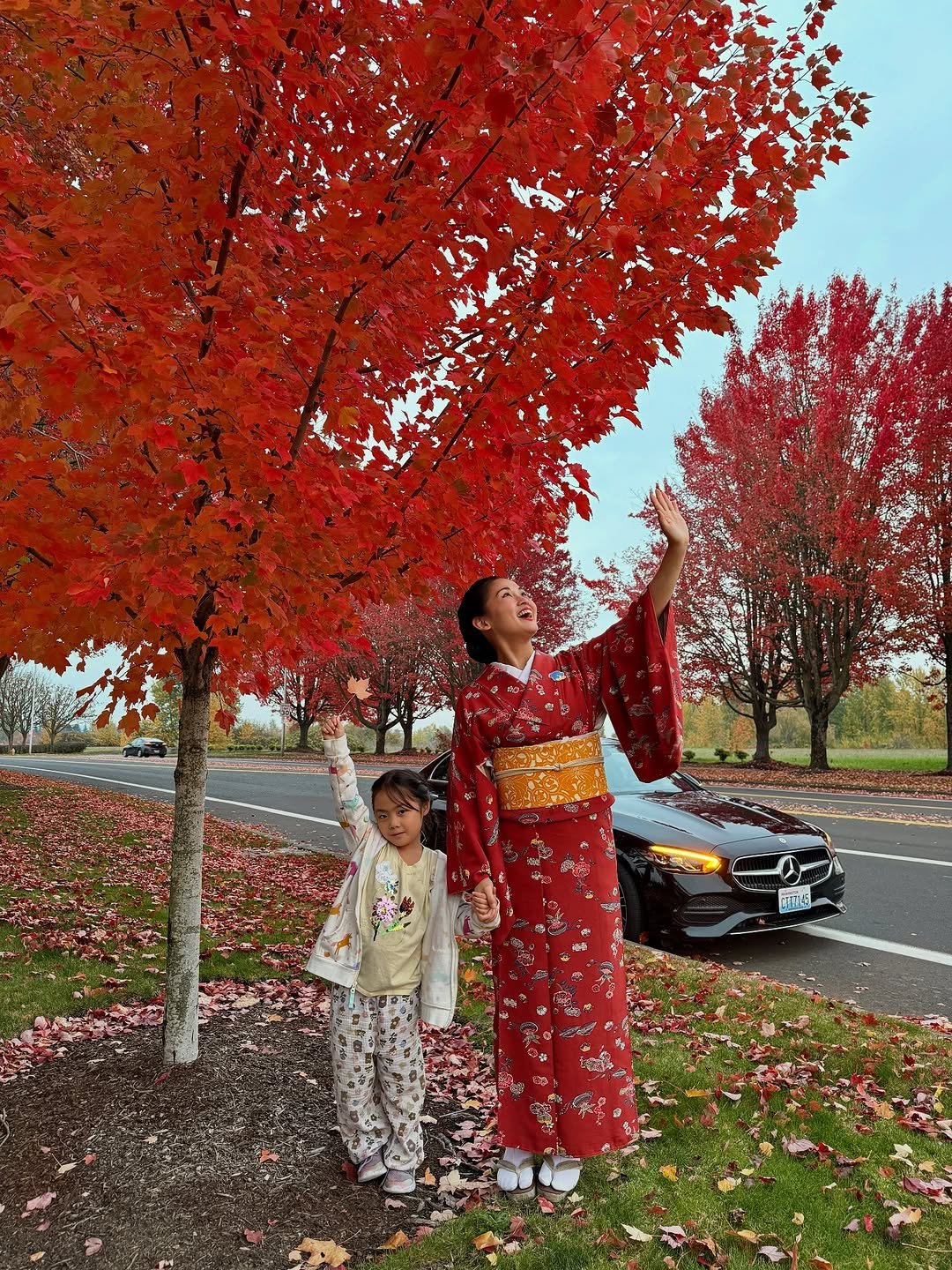 Photo shared by MOE／Kimono Mom on November 12, 2025 tagging @avis.japan. May be an image of child, maple leaves and text.