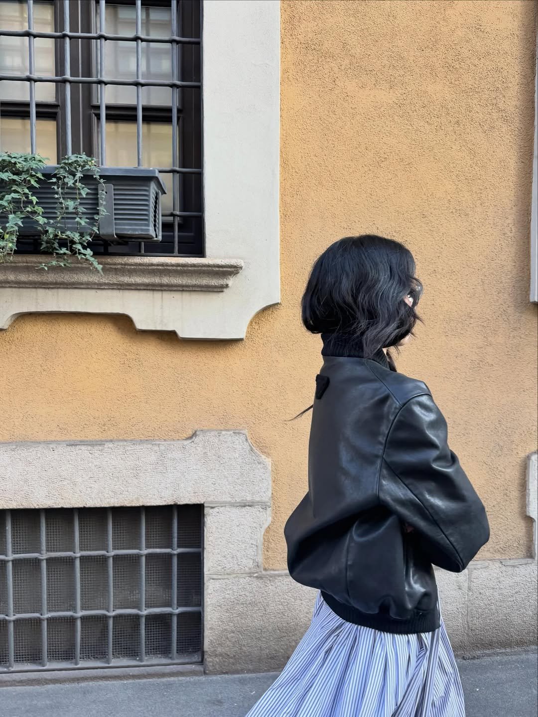 Photo shared by 김태리 on February 26, 2026 tagging @prada. May be an image of headscarf and text.