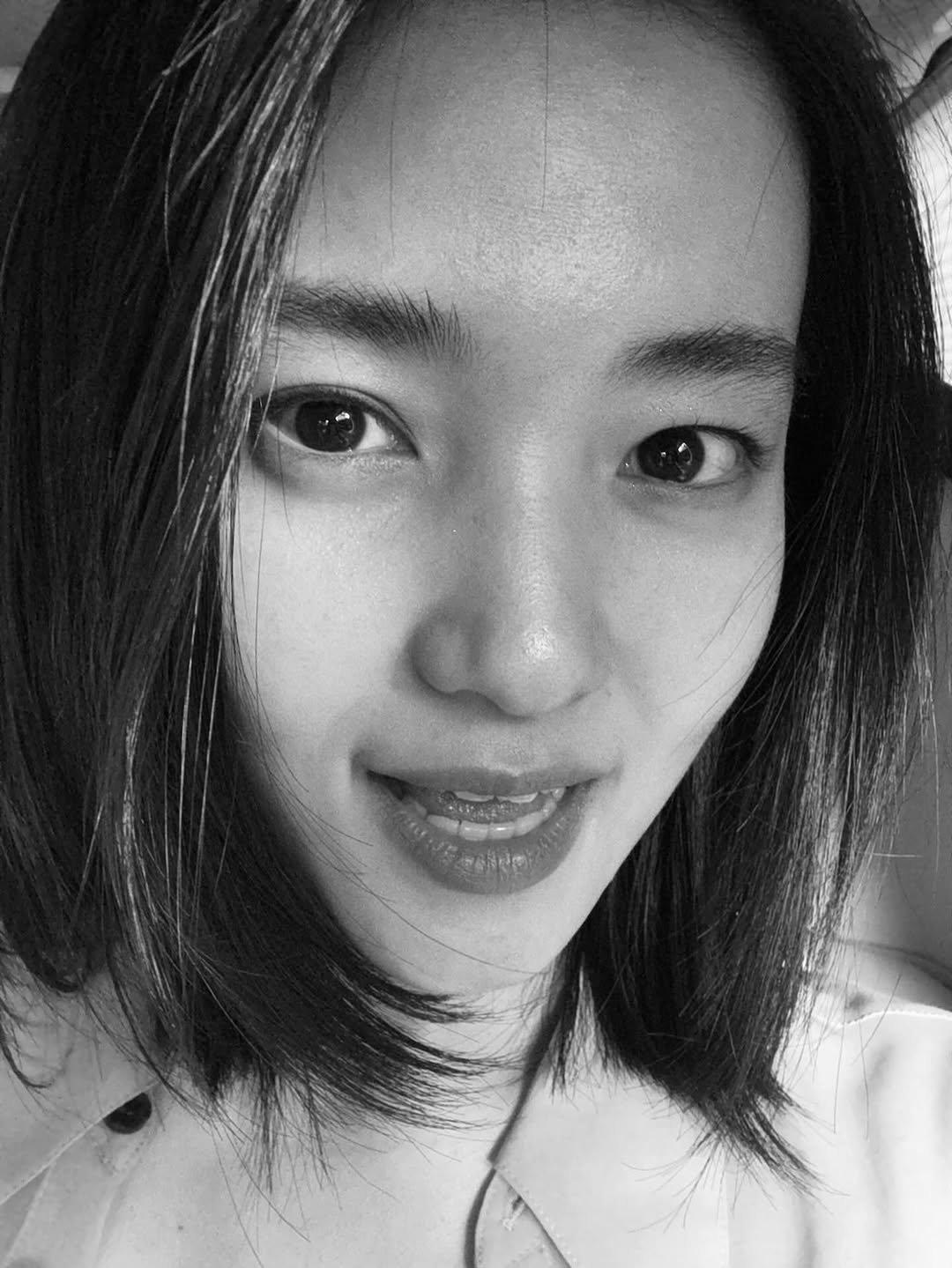 Photo by 김태리 on September 29, 2025. May be a black-and-white image of one or more people, lipstick, hair, people smiling and text.