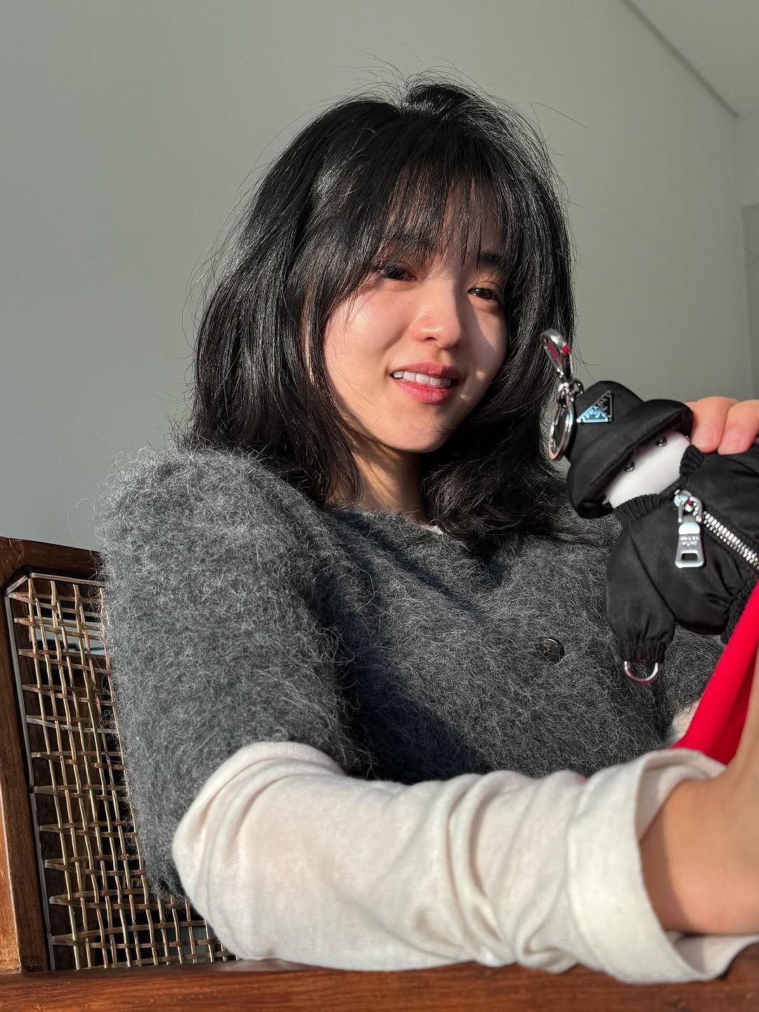 Photo by 김태리 on November 22, 2025. May be a selfie of one or more people, hair, penguin, phone, sweater, sweatshirt and text.