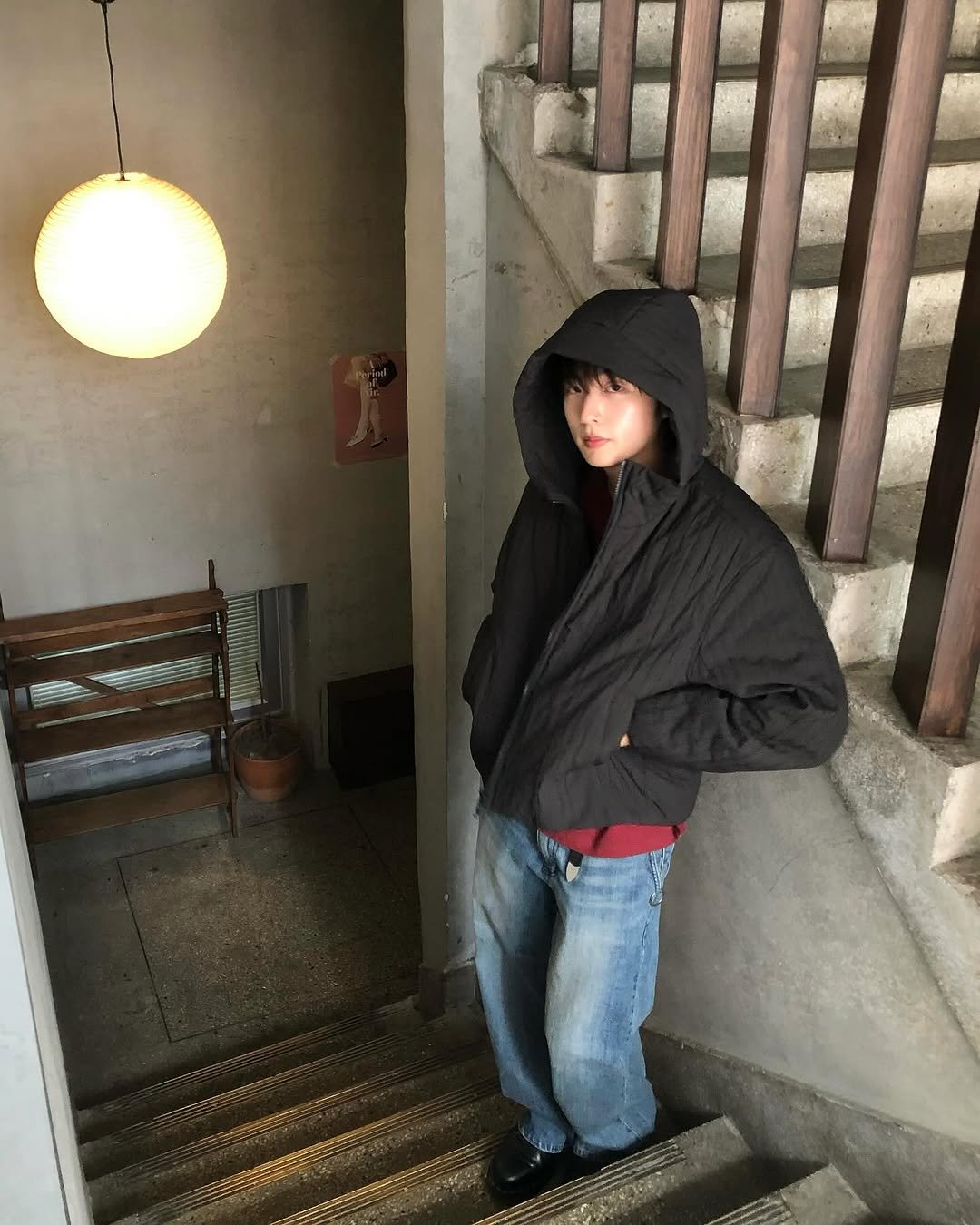 Photo shared by 정 한 on September 08, 2025 tagging @kream.co.kr, and @tngt_official. May be an image of 1 person, duffle coat, overcoat, cloak, raincoat, parka and text.