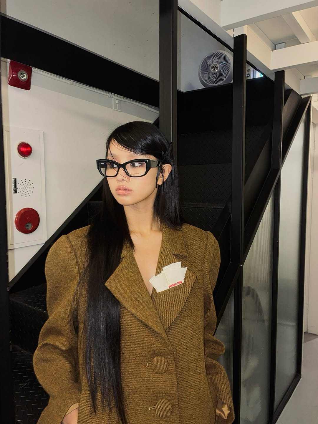 Photo by KISS OF LIFE on November 12, 2025. May be an image of sable coat, overcoat, cardigan, turtleneck and text.