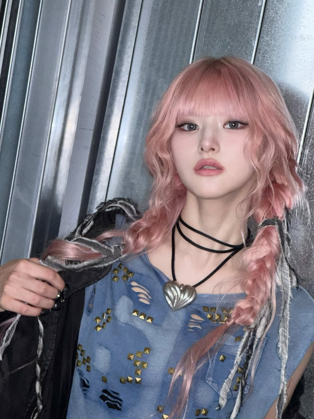 Photo by KISS OF LIFE on November 10, 2025. May be an image of one or more people, bangs, braids, blonde hair, bolo tie and text.