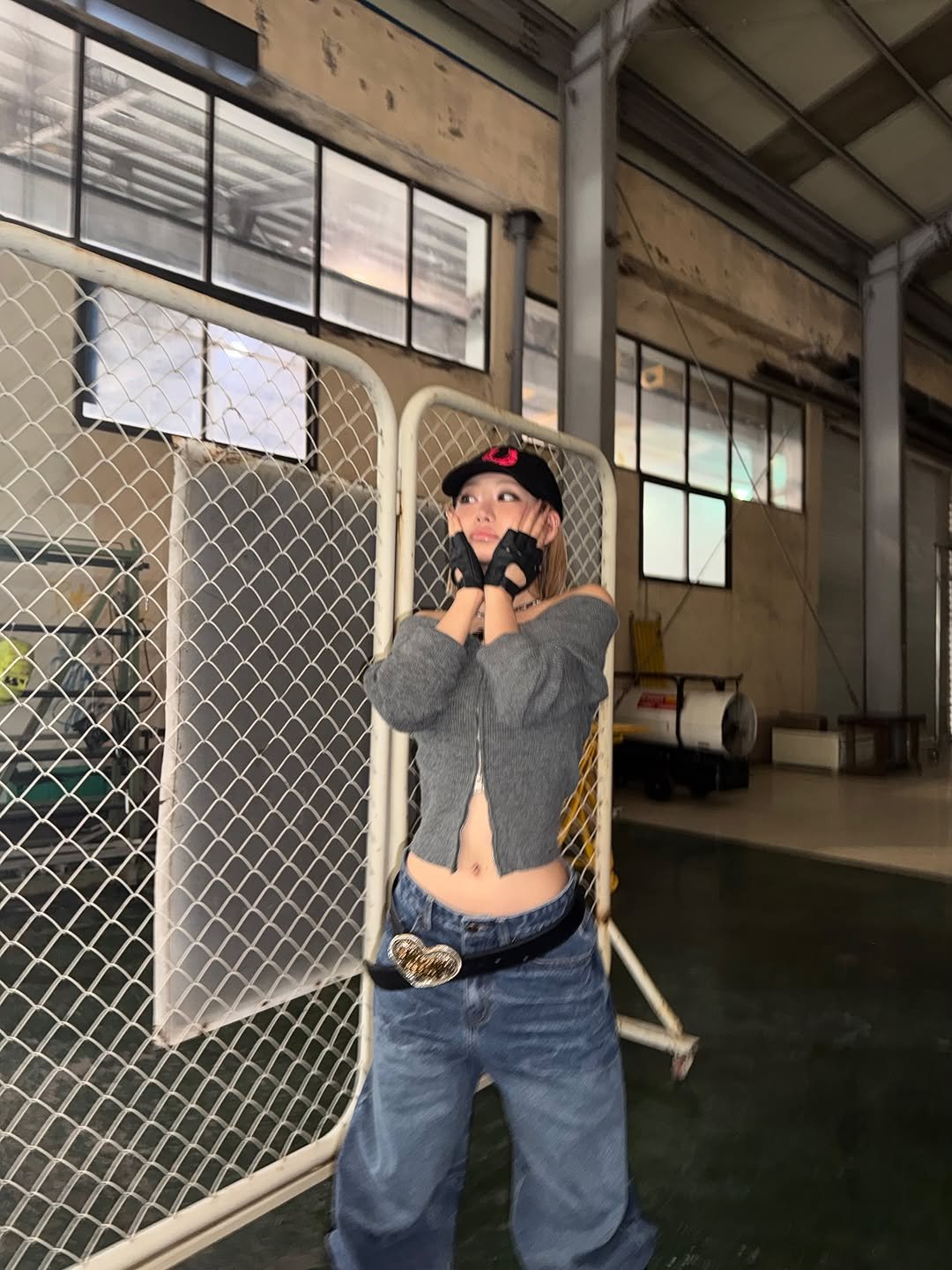 Photo by KISS OF LIFE on September 24, 2025. May be an image of 1 person, bandanna, belt and text.