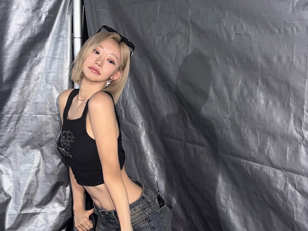 Photo by KISS OF LIFE on September 24, 2025. May be an image of 1 person, blonde hair, top, bra and text.