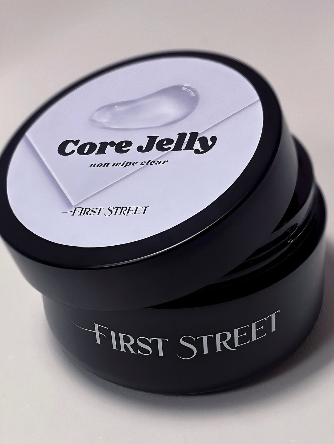 Photo shared by KJ킹지 on July 26, 2025 tagging @1.st_nail. May be an image of salve, hand cream, ointment and text that says 'Core CoreJelly Jelly non wipe nonwipeclear clear FIRSTSTREET FIRST STREET FIRST STREET'.
