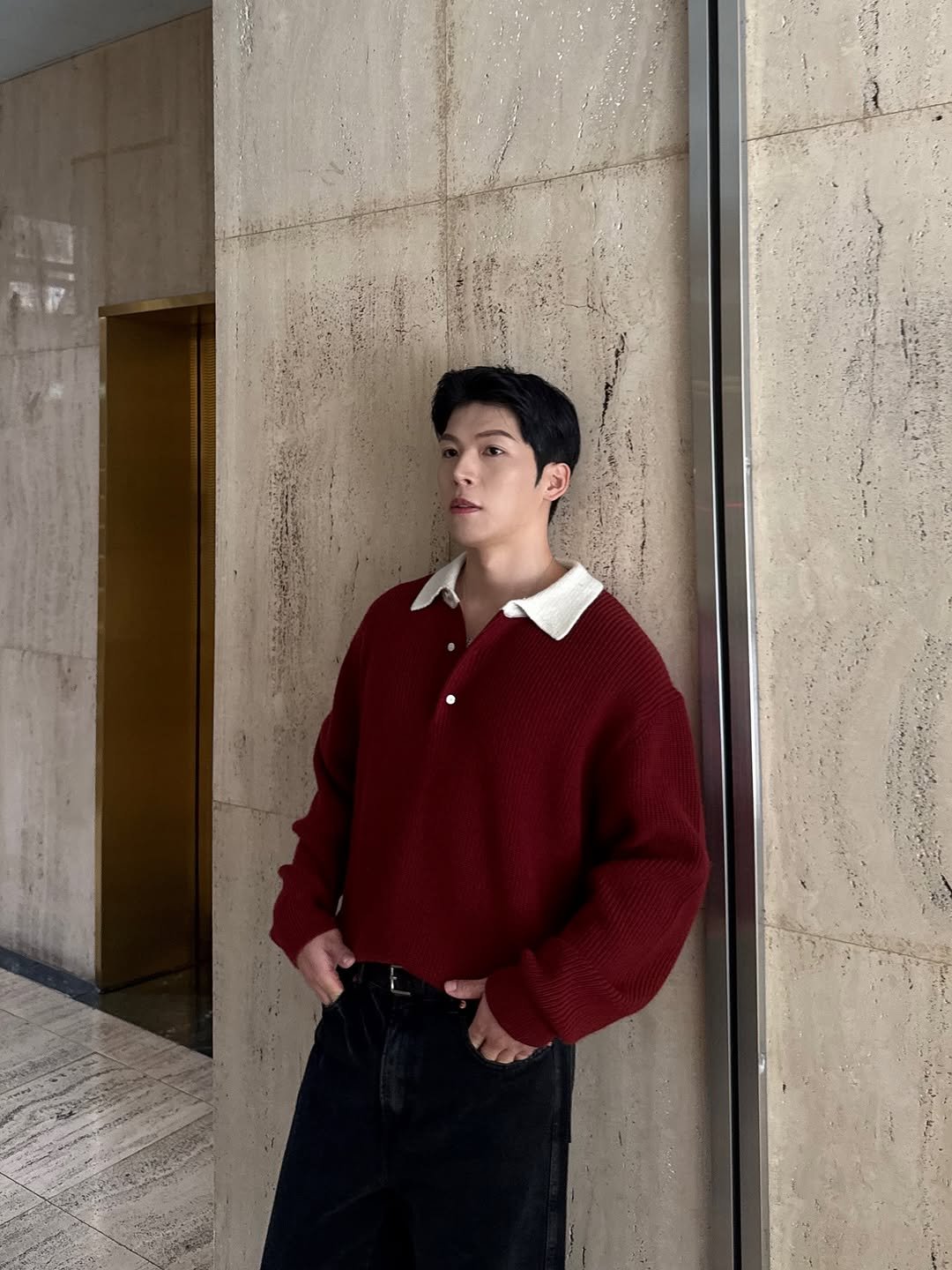 Photo shared by Daeheon Kang on October 18, 2025 tagging @kkst.official, and @mergo__official. May be an image of one or more people, hair, duffle coat, top, turtleneck, bolo tie and text.