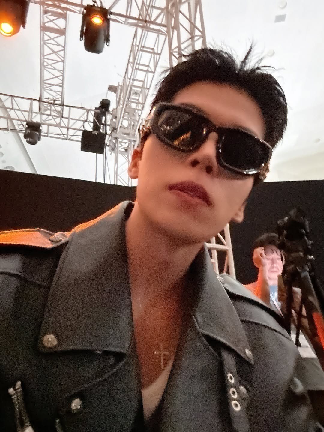 Photo by Daeheon Kang on September 08, 2025. May be an image of 1 person, bangs, top, bolo tie, concert and text.