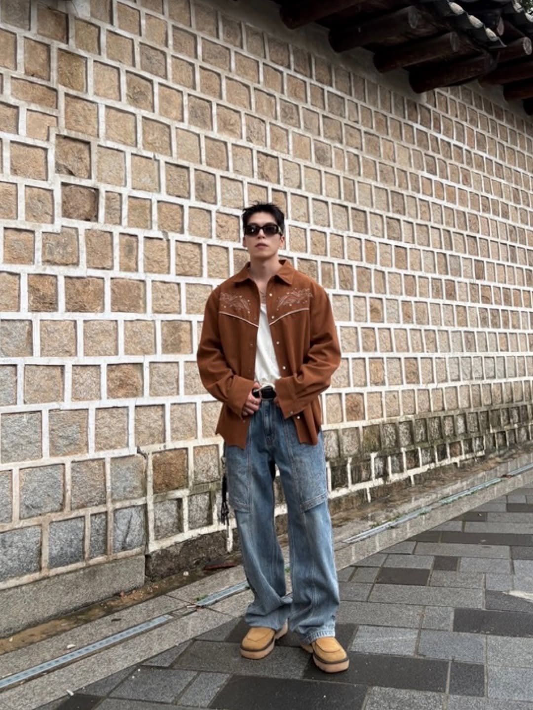 Photo by Daeheon Kang on September 06, 2025. May be an image of 1 person, duffle coat and text.