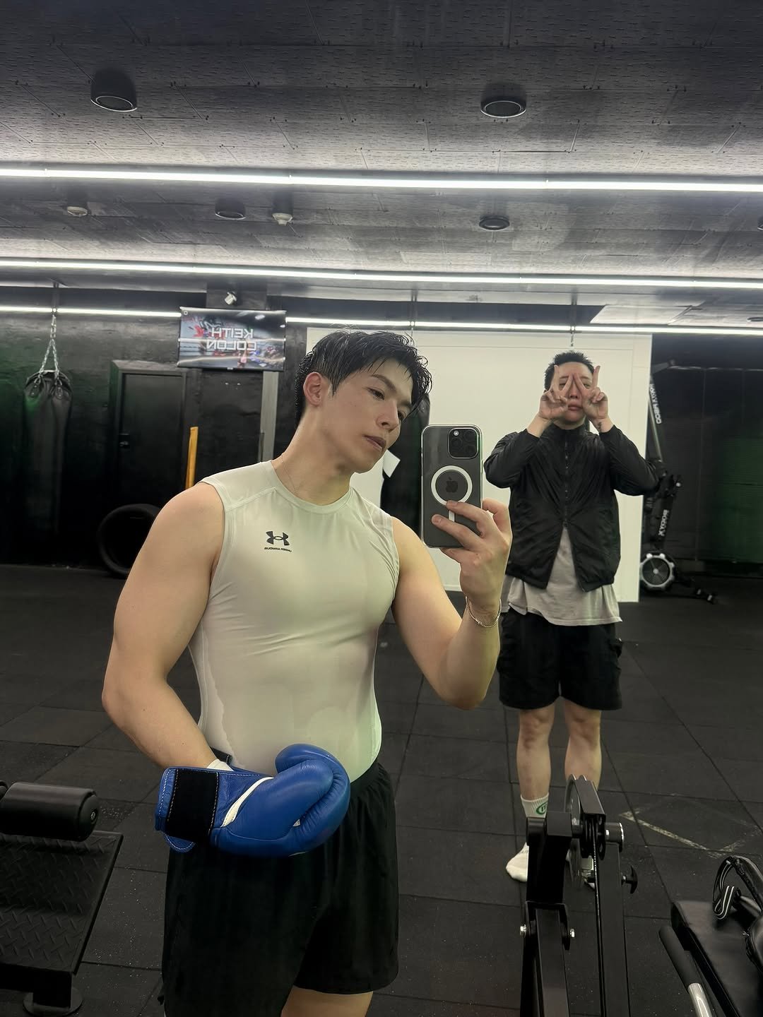 Photo by Daeheon Kang on November 08, 2025. May be an image of one or more people, biceps, activewear, punching bag and text.