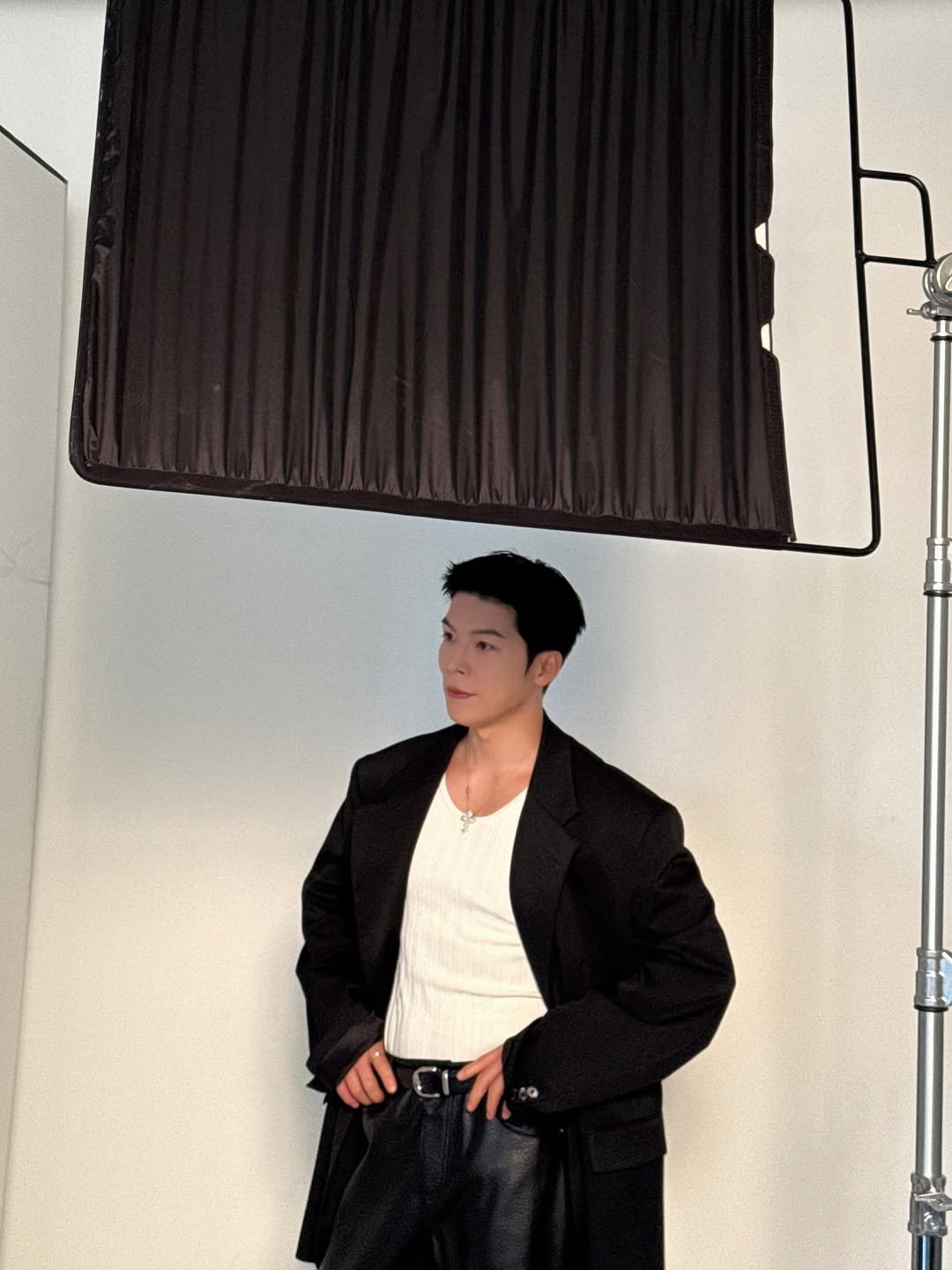 Photo by Daeheon Kang on August 08, 2025. May be an image of 1 person, suit, outerwear, blazer and text.