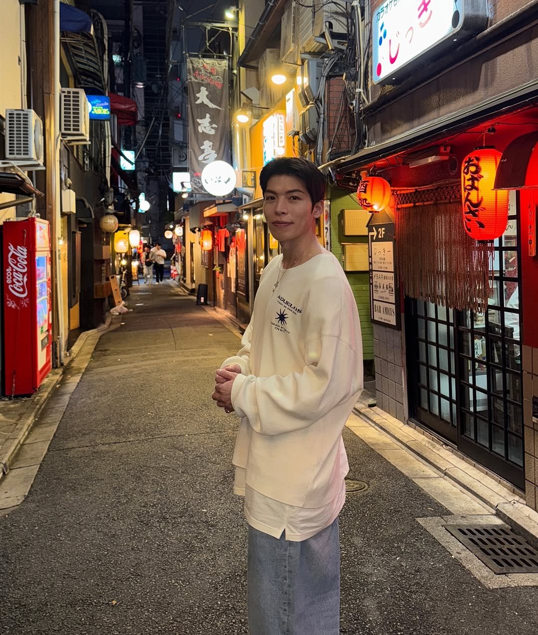 Photo by Daeheon Kang on October 08, 2025. May be an image of 2 people, Fushimi Inari Taisha, street and text.