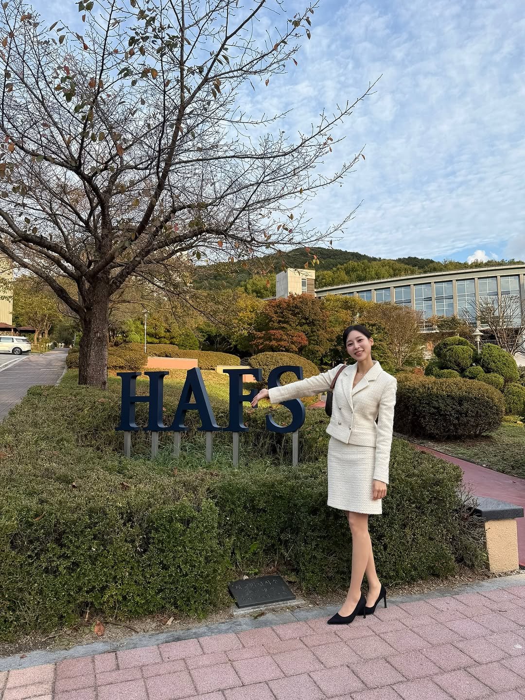 Photo by 박소현 on October 24, 2025. May be an image of suit, outdoors and text.