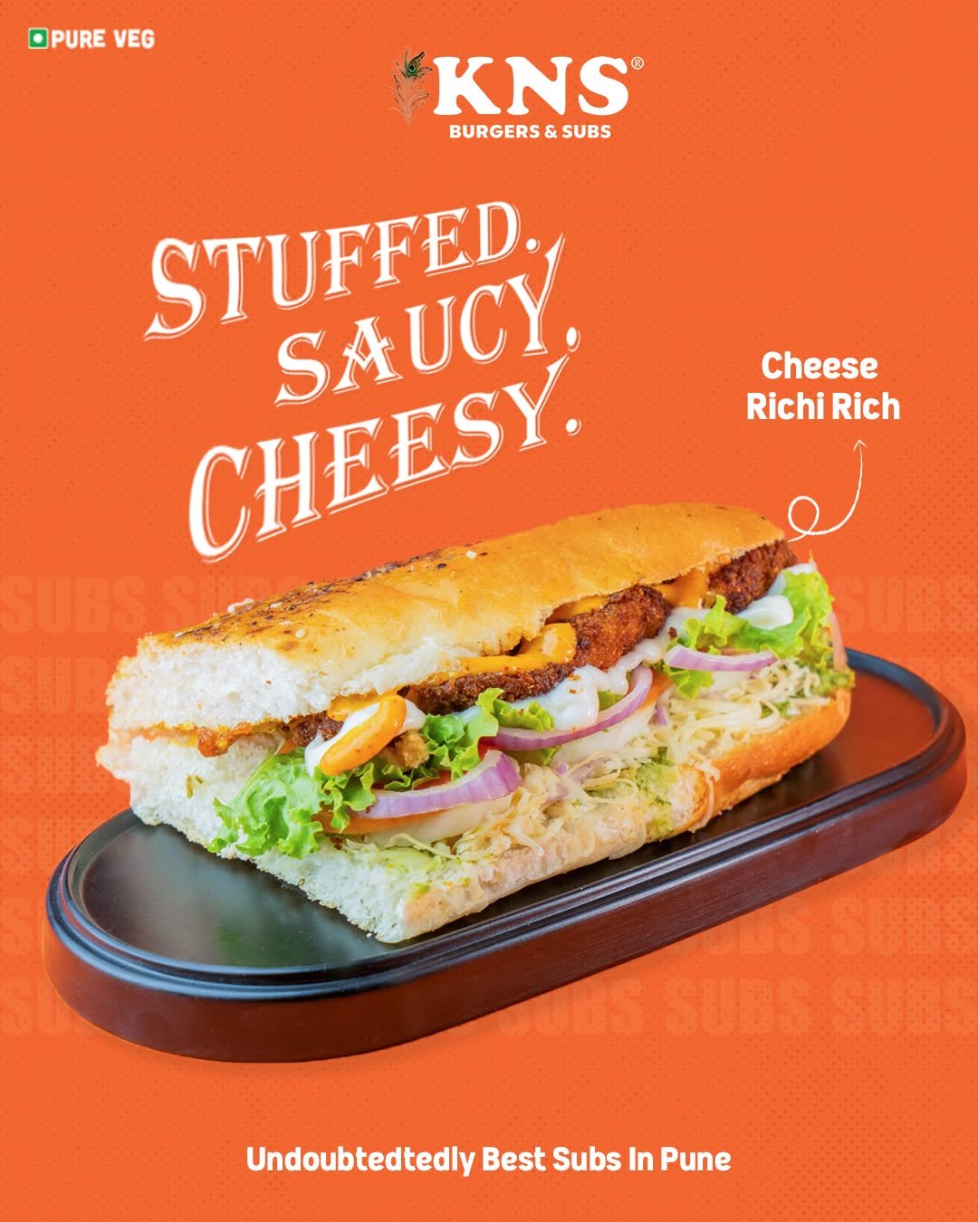 Photo by KNS Official on August 20, 2025. May be an image of sub sandwich, sandwich, bread and text that says 'OPURE VEG KNS ® BURGERS BURGERS&SUBS & SUBS STUFFED. SAUCY. CHEESY. Cheese Richi RichiRich iRich Rich UndoubtedtedlyBestSubsInPune Undoubtedtedly Best Subs In Pune'.
