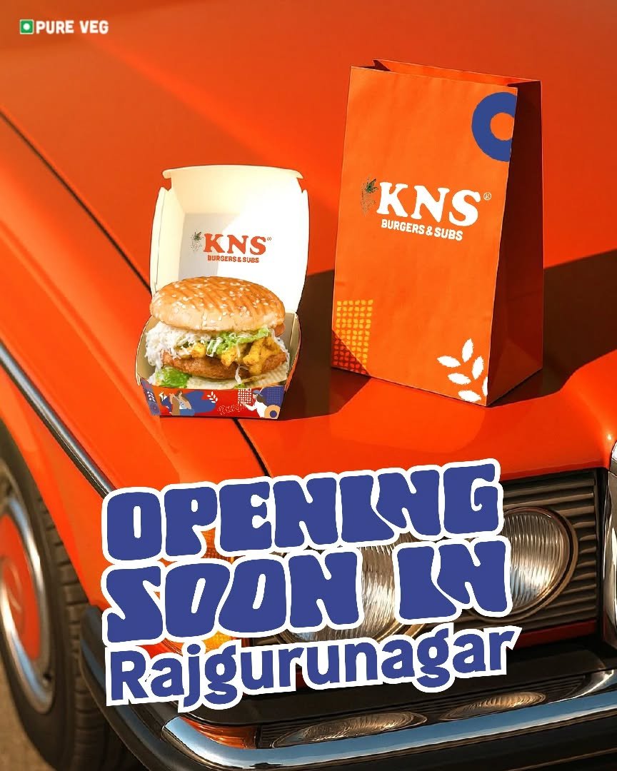 Photo by KNS Official on September 17, 2025. May be an image of chicken, burger, car, poster and text that says 'OPUREVEG PURE VEG KNS BURGERSLSUBS SUBS DURBER SU KNS ® BURGERS BURGERS&SUBS & SUBS OPENING SOON IN Rajgurunagar KAKApblA'.