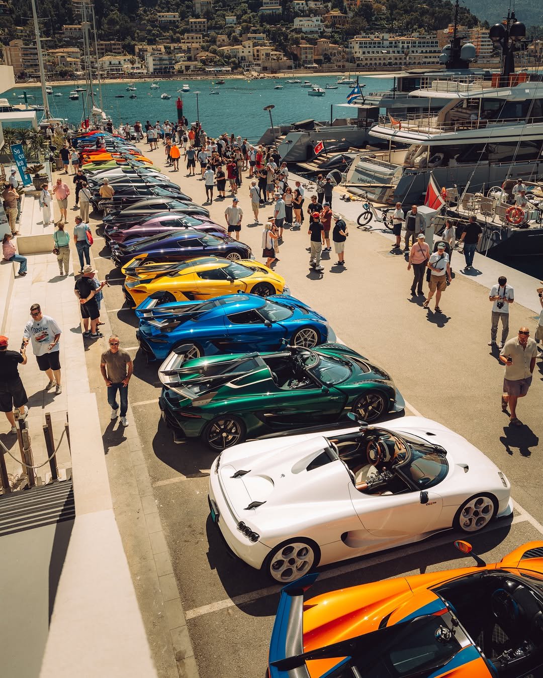 Photo by KOENIGSEGG on April 27, 2026. May be an image of racing vehicles, convertible, roadster, race car, wheel, crowd and text.