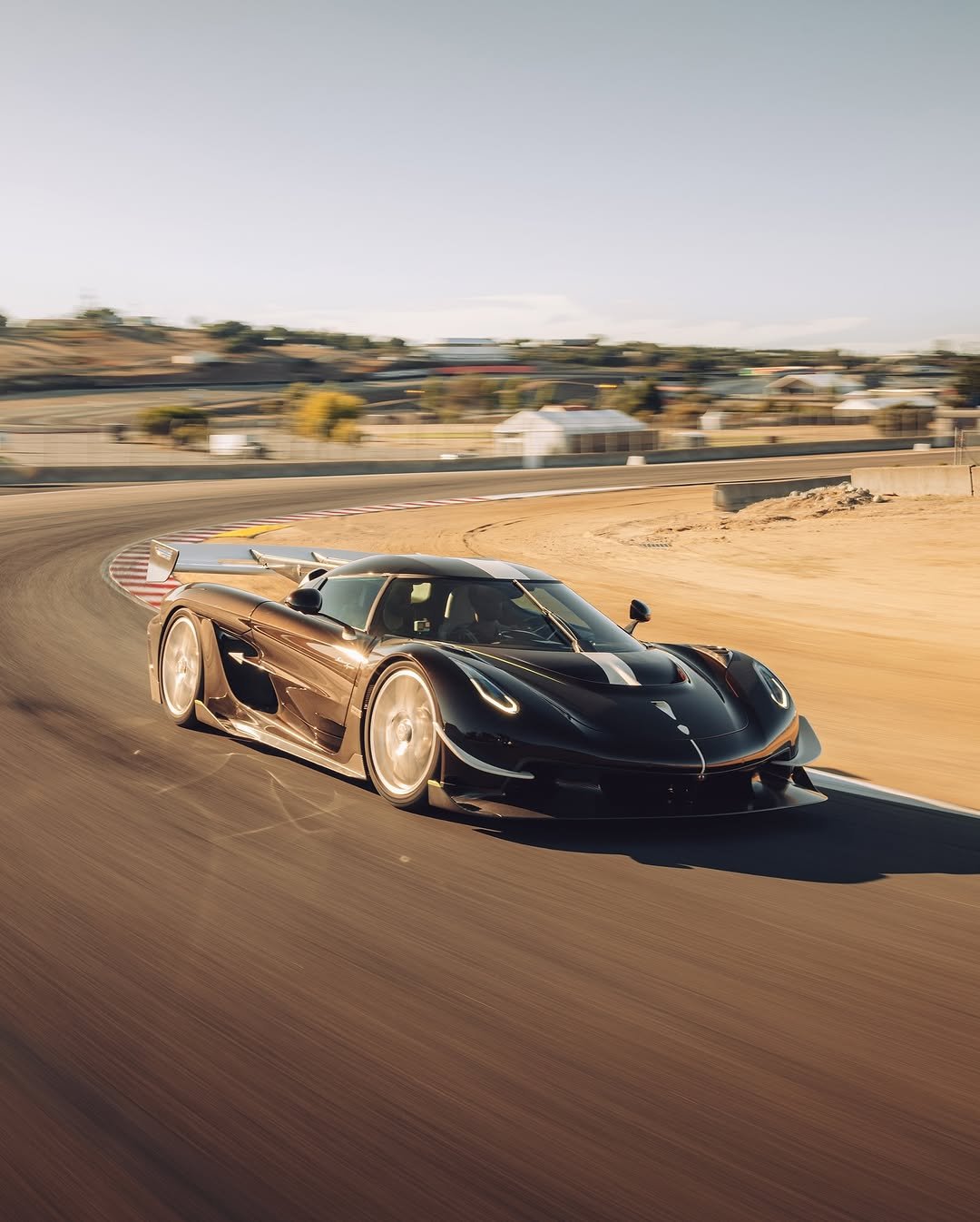 Photo by KOENIGSEGG on November 07, 2025. May be an image of racing vehicles, race car, wheel, road and text.