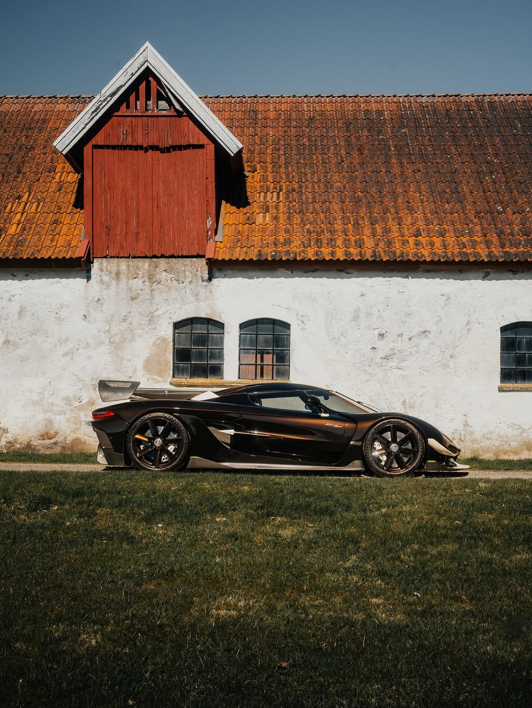 Photo by KOENIGSEGG on April 09, 2026. May be an image of race car, blower, roadster and text.