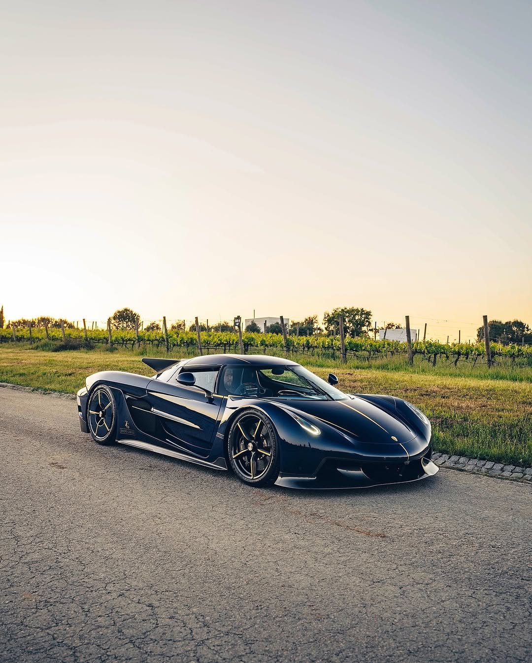 Photo by KOENIGSEGG on October 07, 2025. May be an image of race car, wheel, roadster, road and text.