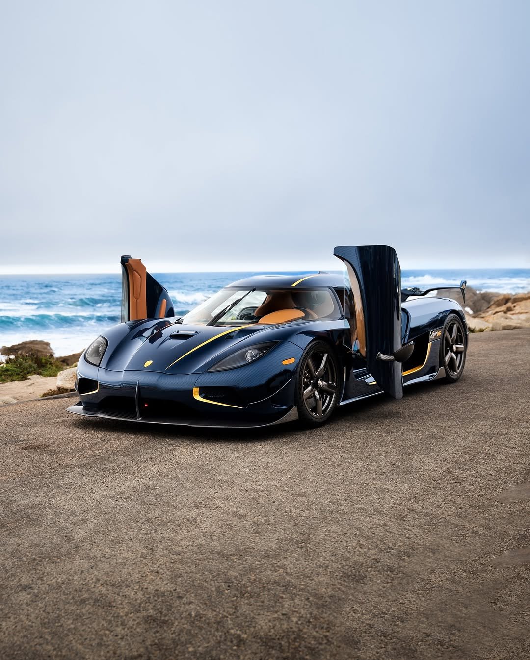 Photo by KOENIGSEGG on October 20, 2025. May be an image of race car, roadster, wheel, road and text.