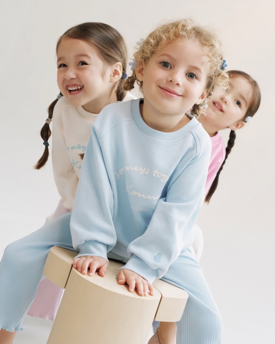 Photo by Konny l 코니 on February 04, 2026. May be an image of child, sleepwear, drawstring, sweatshirt and text.