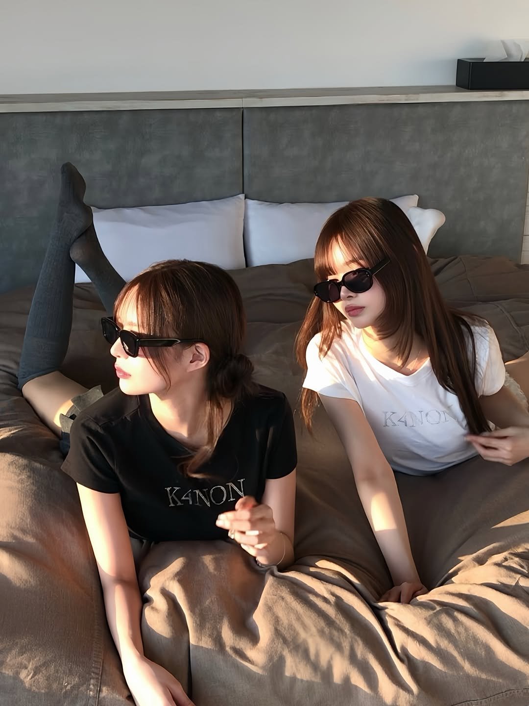 Photo by このん on March 27, 2026. May be an image of sleepwear, eyewear, bed, beanbag chair and text.