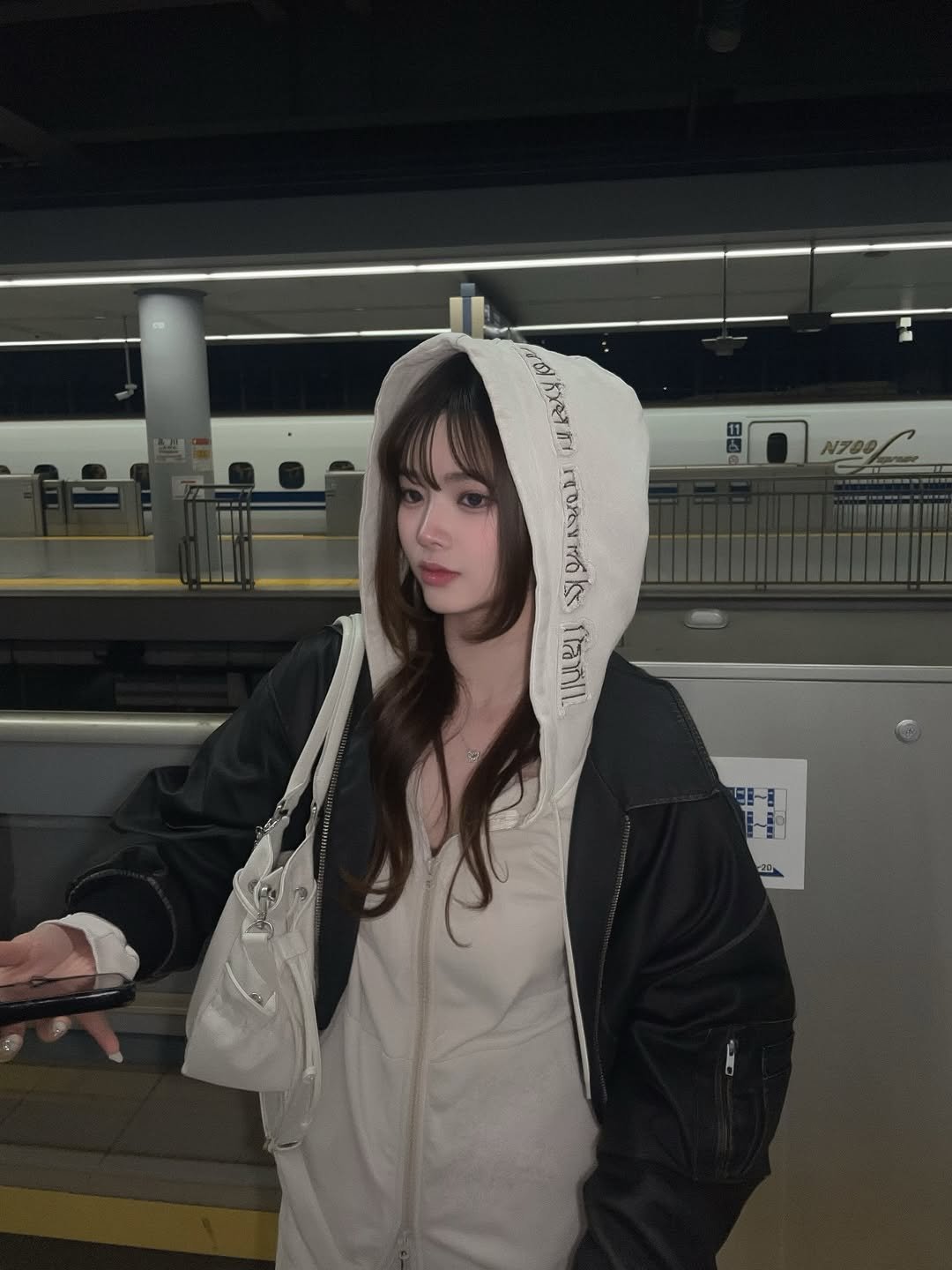 Photo shared by このん on March 25, 2026 tagging @k4n0n.official. May be an image of duffle coat, train, bath robe, parka, cloak, jacket, raincoat and text.