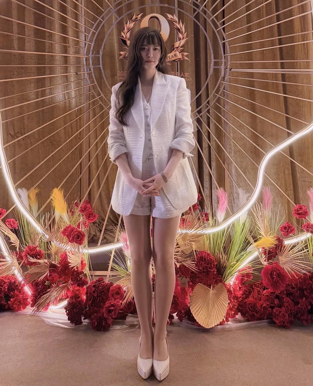 Photo by 구혜선 on December 17, 2025. May be an image of jumpsuit, headdress, dress and text.