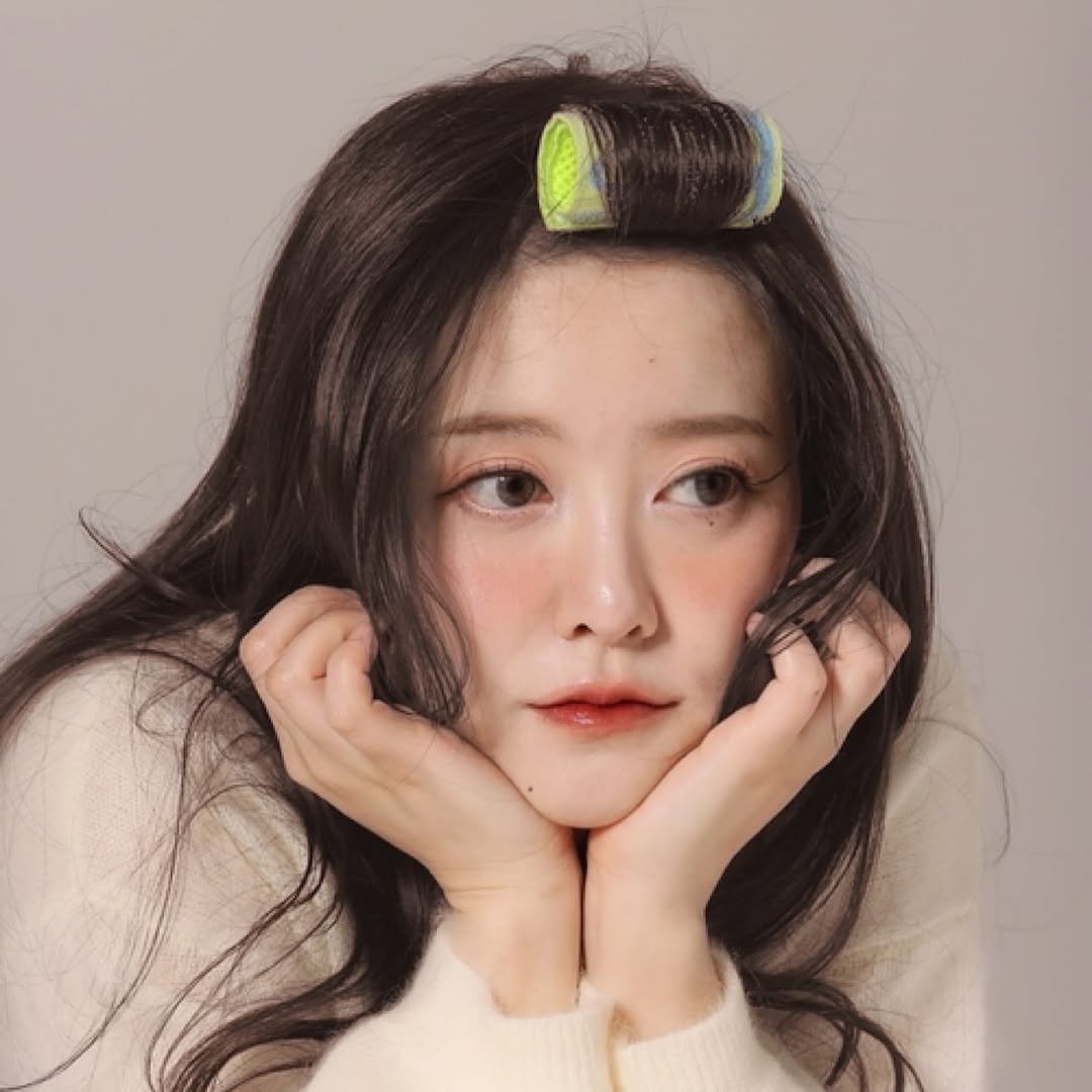 Photo shared by 구혜선 on October 31, 2025 tagging @grabity_korea. May be an image of one or more people, braids and hair brush.