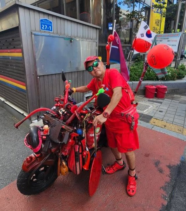 Photo by 코리아할렘 on August 15, 2025. May be an image of 1 person, scooter, Tokyo Tower and text.