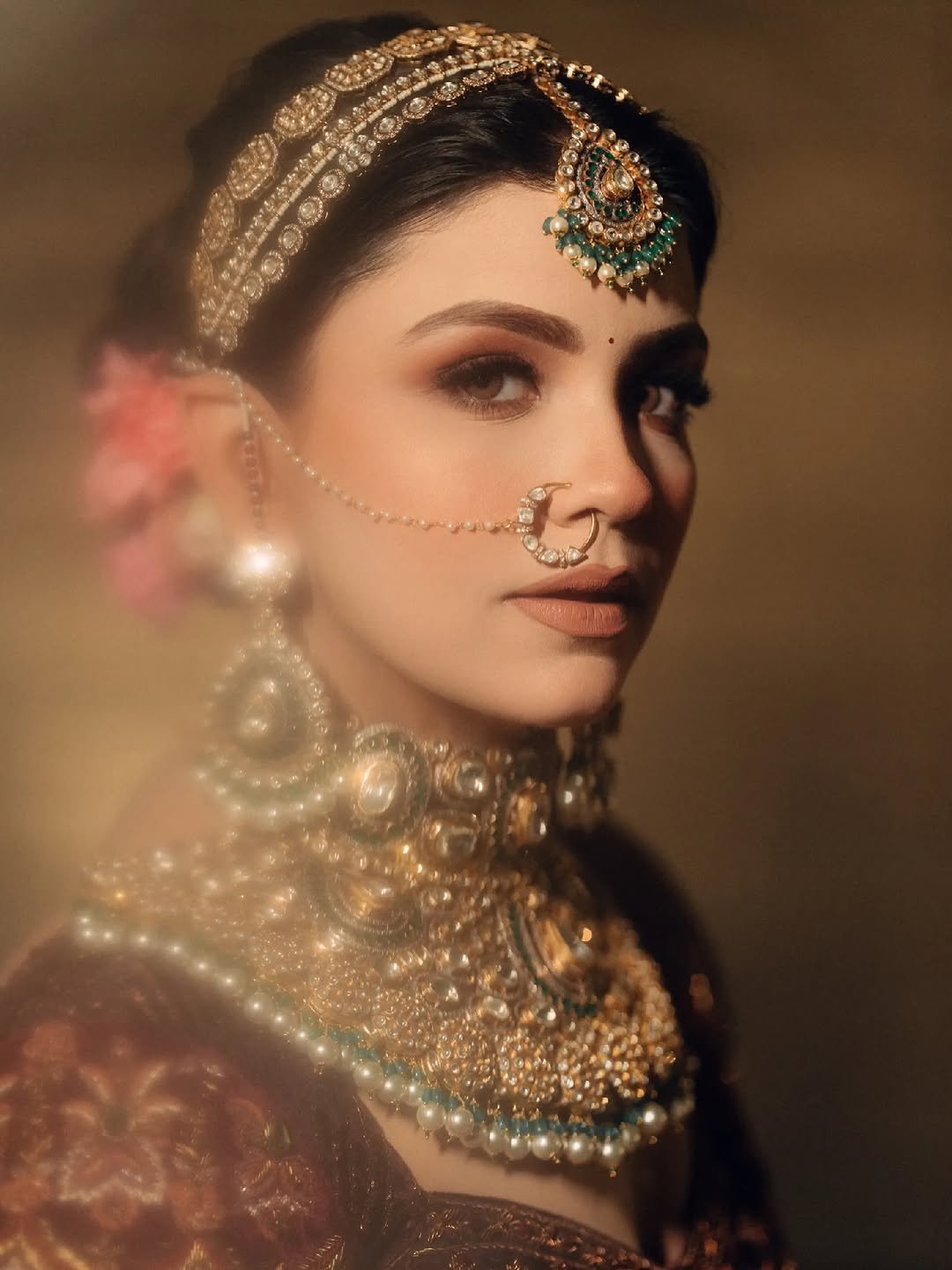 Photo shared by Kriti Duggal on April 28, 2026 tagging @radhika_jidani. May be an image of one or more people, henna, makeup and text.