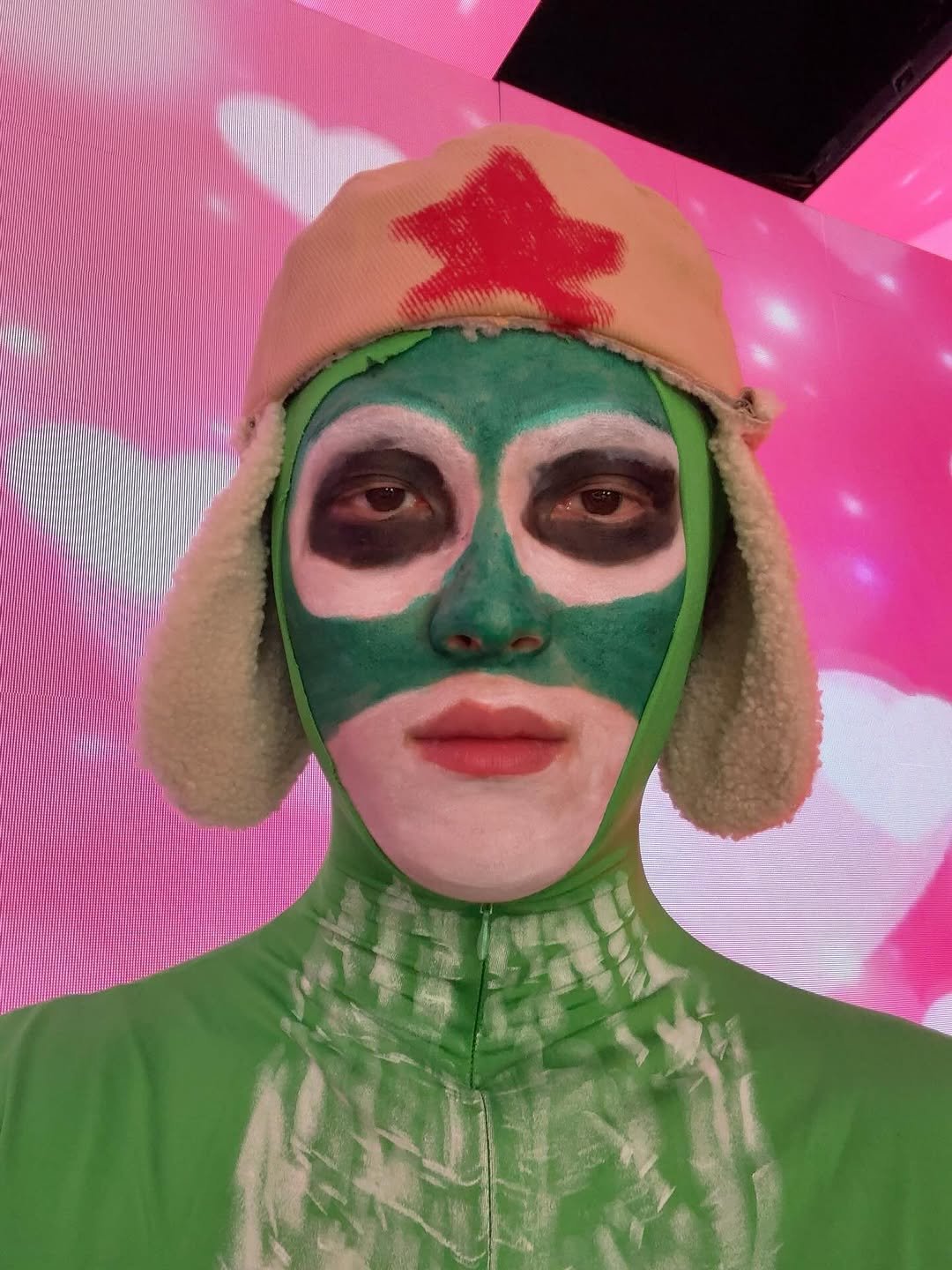 Photo by 김윤태 on October 01, 2025. May be pop art of one or more people, makeup, turtleneck, costume and text.