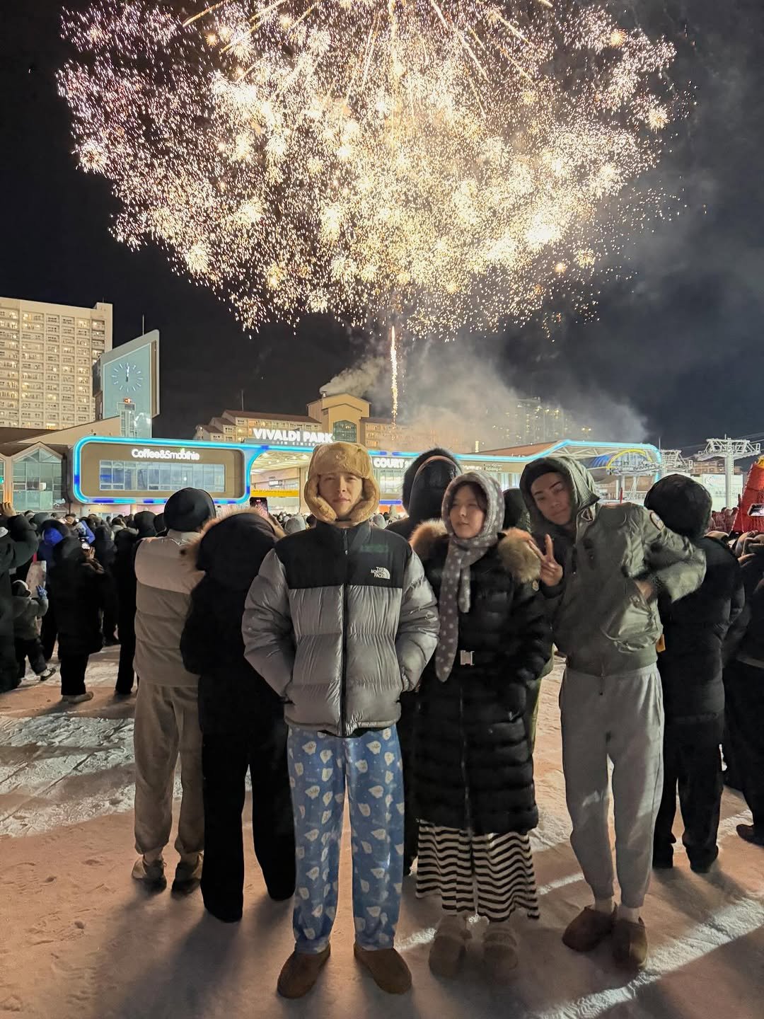Photo by 김윤태 on December 31, 2025. May be an image of one or more people, fireworks, night and text.