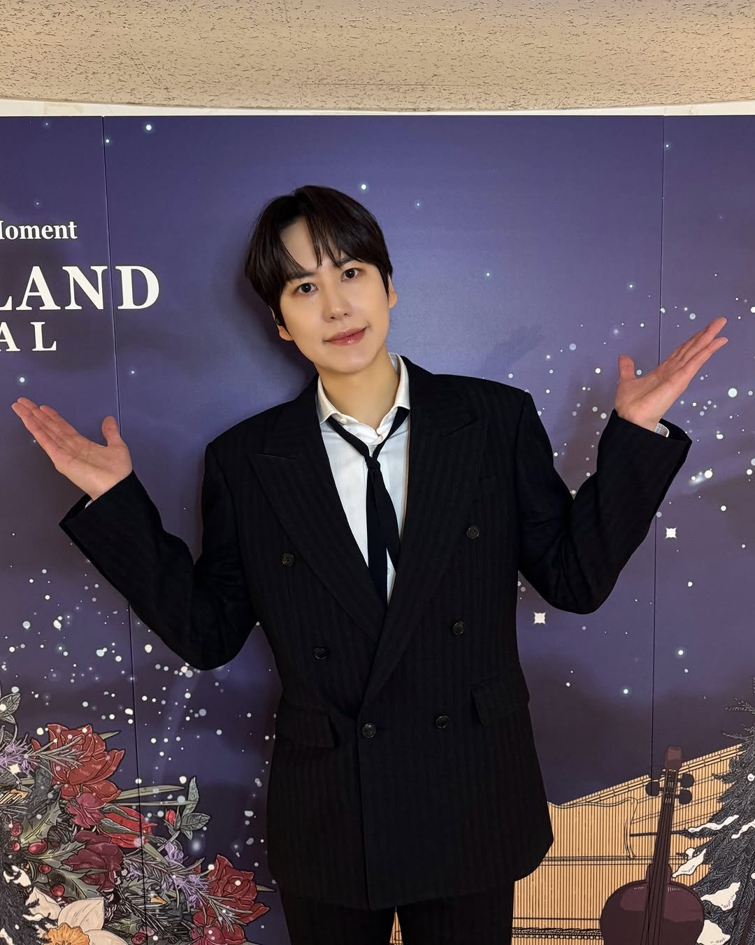 Photo by 규현 KYUHYUN on December 28, 2025. May be an image of bolo tie and text that says 'oment AND AL HN'.