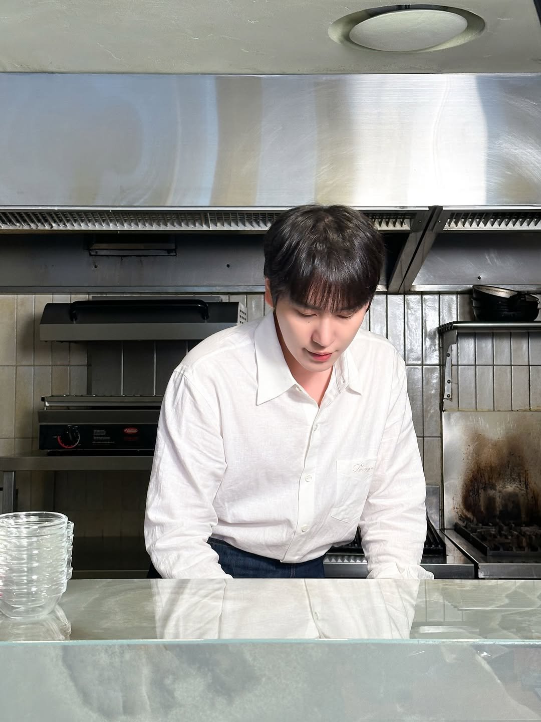 Photo shared by 규현 KYUHYUN on February 11, 2026 tagging @gyuram88. May be an image of cooker, kitchen and text.
