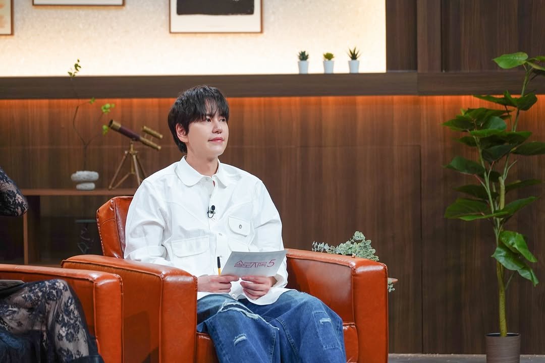 Photo shared by 규현 KYUHYUN on January 31, 2026 tagging @gyuram88. May be an image of one or more people, bangs, top and text.