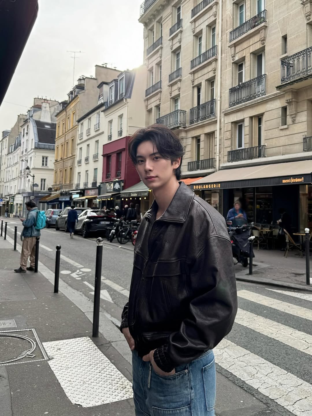 Photo shared by 이채민 Lee Chae Min 李彩玟 on January 29, 2026 tagging @ysl. May be an image of outerwear, Sacré-Cœur and text.